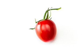 Strawberry tomato over white