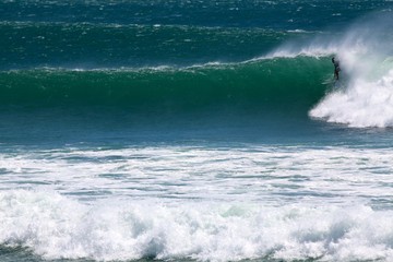 Fototapeta premium Perfect waves at Kirra Beach during Cyclone Oma, Gold Coast Queensland Australia surfing.