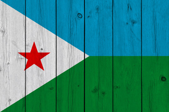 Djibouti flag painted on old wood plank