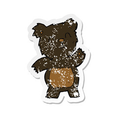 retro distressed sticker of a cartoon black bear