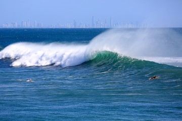 Perfect waves and surfing at Snapper Rocks during Cyclone Oma, Gold Coast., Queensland Australia