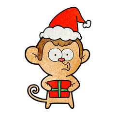 textured cartoon of a christmas monkey wearing santa hat