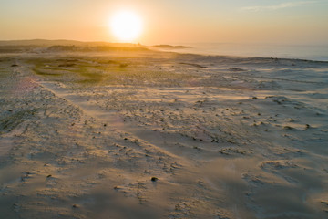 Sunset over ocean beach