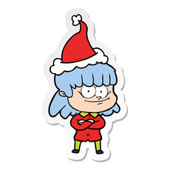 sticker cartoon of a smiling woman wearing santa hat