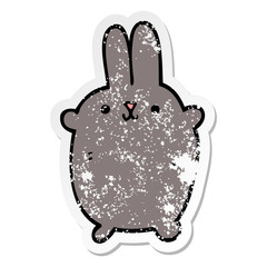 distressed sticker of a cartoon rabbit