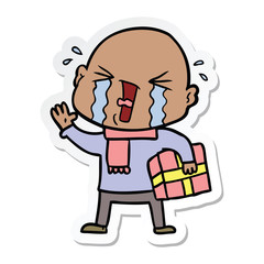 sticker of a cartoon crying bald man