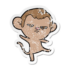 Obraz premium distressed sticker of a cartoon annoyed monkey