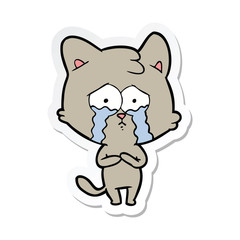 sticker of a cartoon crying cat