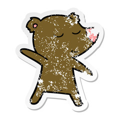 distressed sticker of a happy cartoon bear