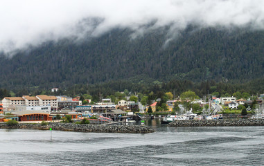 Sitka Alaska from the water on a grey cloudy day.