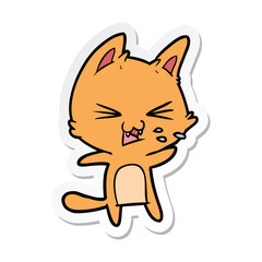 sticker of a cartoon cat hissing