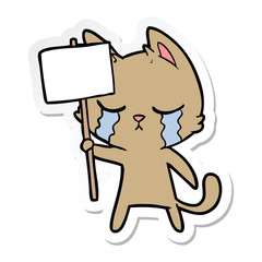 sticker of a crying cartoon cat