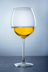 white wine glass. tasting wine background.