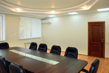 interior of a room with chairs and table