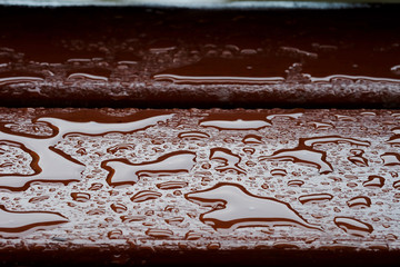 Droplet of water on wood and sunlight after rain, high durable material for using long lasting material furniture for safety and save money, with space for write wording