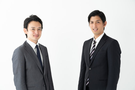 portrait of two asian businessman on white background