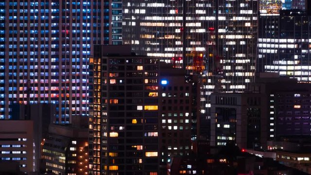 東京夜景・タイムラプス・大都会のオフィスビル＆マンション