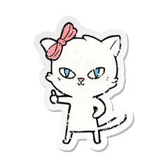 distressed sticker of a cute cartoon cat giving thumbs up symbol
