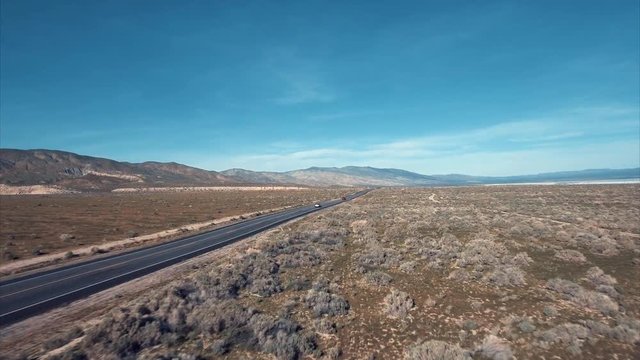 Above the road, aerial shot of the desert, 4k