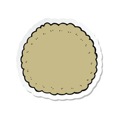 sticker of a cartoon biscuit