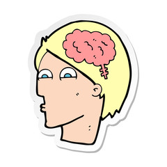sticker of a cartoon head with brain symbol