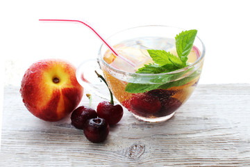 Menu diet plan or program, a glass of cocktail berries, tape measure, dumbbells and diet food fresh fruits . Weight loss and the concept of detoxification