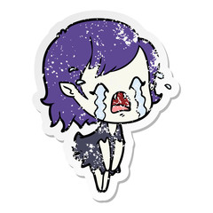 distressed sticker of a cartoon crying vampire girl