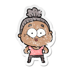 distressed sticker of a cartoon happy old woman