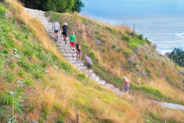 People on stone steps down track up Mount Maunganui