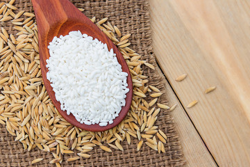 raw paddy rice on table 