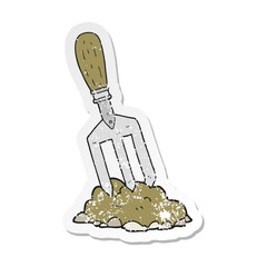 retro distressed sticker of a cartoon garden fork