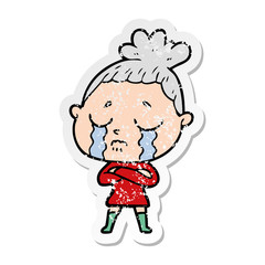 distressed sticker of a cartoon crying woman