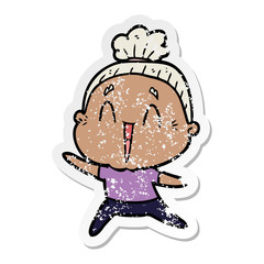 distressed sticker of a cartoon happy old lady