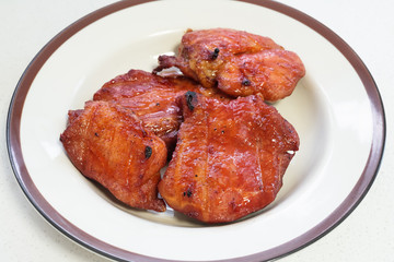 Thai red BBQ pork or Chinese style roasted pork.
