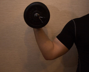 Fototapeta na wymiar Man hold dumbbell, sport clothes, exercise for arm, light background, biceps