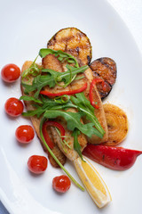 fried zuchini slices, cherry tomatoes and baked eggplants