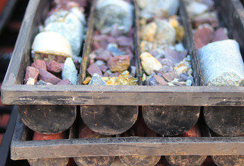 Stacking of old ore samples laying at the disposal area