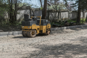 Asphalt machine that is on the road and is ready to work.