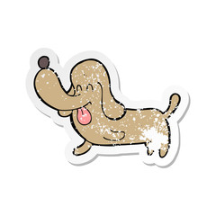 retro distressed sticker of a cartoon happy dog