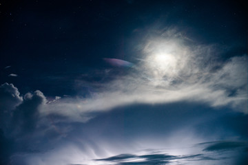 Moonlight over the clouds
