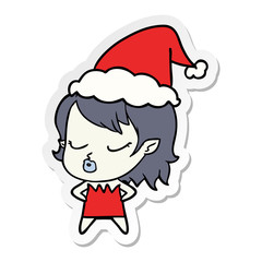 cute sticker cartoon of a vampire girl wearing santa hat