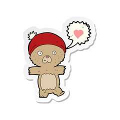 sticker of a cartoon bear in hat