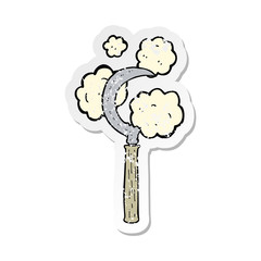 Obraz premium retro distressed sticker of a cartoon sickle