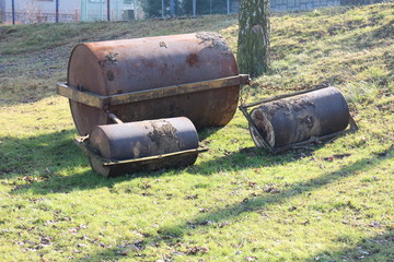 Obraz premium Rollers on grass on football playground in Kobeřice, Czech republic