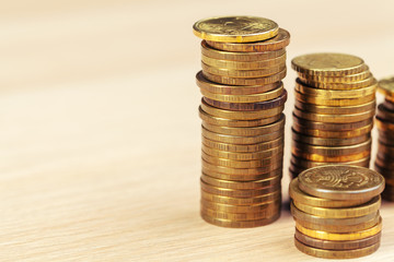 piles of coins on working table