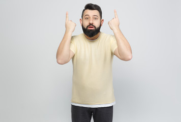 Fototapeta premium The pretty bearded man shows emotionally