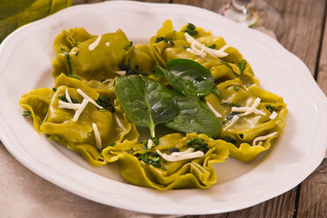 Spinach ravioli with ricotta cheese filling. 