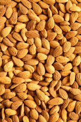 Almonds background, close-up.