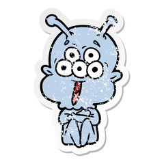 distressed sticker of a happy cartoon alien