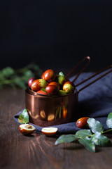 Ziziphus real, capiente, jujube,Chinese date, capiinit, jojoba, Chinese-date (lat.Ziziphus jujuba) on the table. Harvest